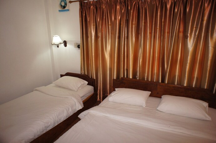 Imagen de la habitación del Hotel Malany Villa 1. Foto 15
