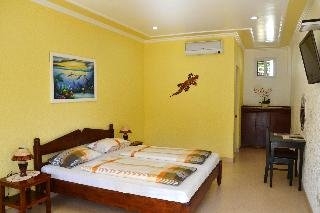 Imagen de la habitación del Hotel Malapascua Garden Resort. Foto 16