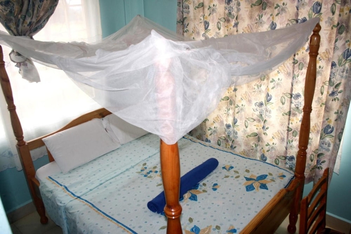 Imagen de la habitación del Hotel Malava Forest Lodge. Foto 13