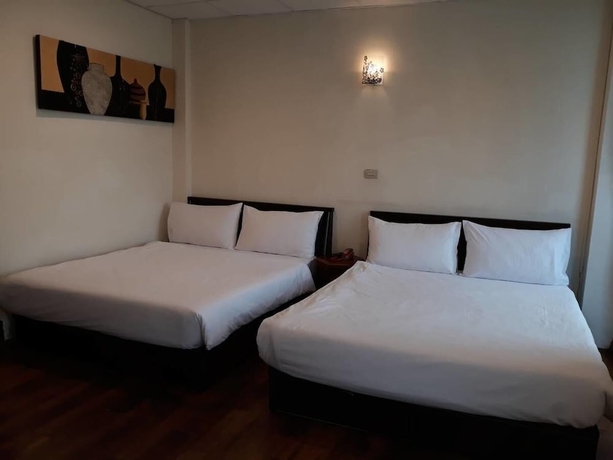 Imagen de la habitación del Hotel Malaya Guesthouse. Foto 5