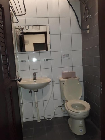 Imagen de la habitación del Hotel Malaya Guesthouse. Foto 9