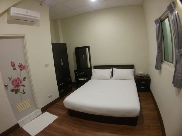 Imagen de la habitación del Hotel Malaya Guesthouse. Foto 14