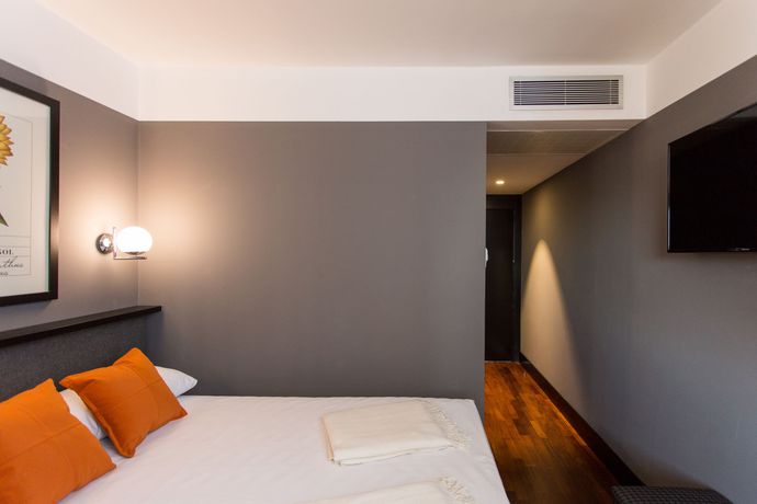 Imagen de la habitación del Hotel Malcom and Barret. Foto 6