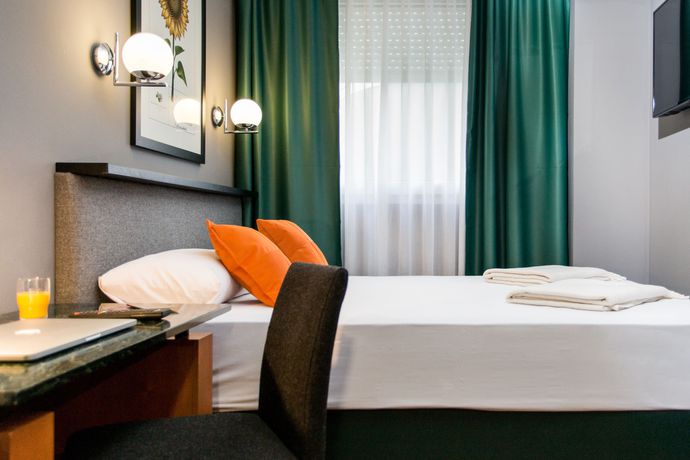 Imagen de la habitación del Hotel Malcom and Barret. Foto 7