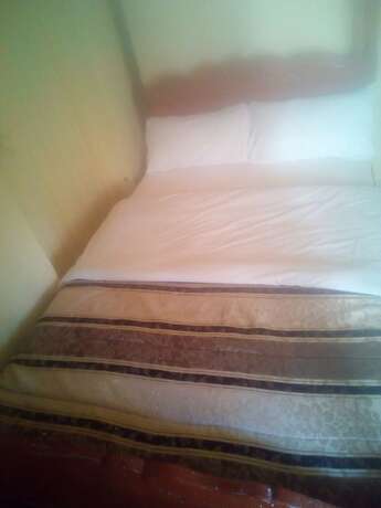 Imagen de la habitación del Hotel Maleck Guest Rooms. Foto 13