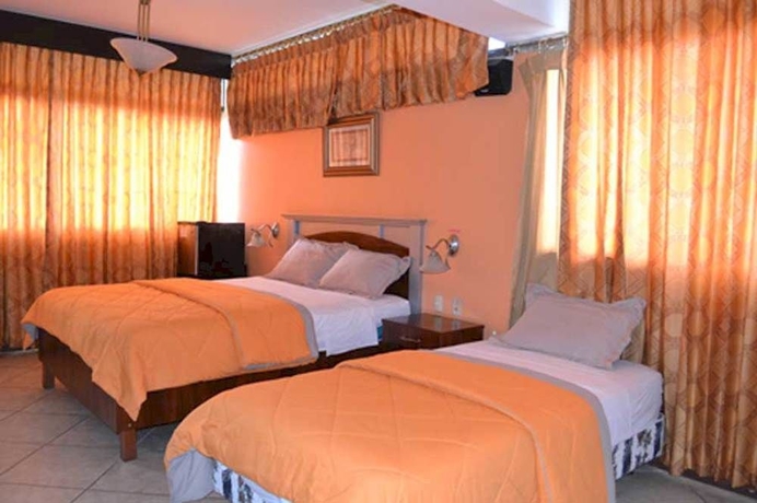 Imagen de la habitación del Hotel Malecon Inn. Foto 5