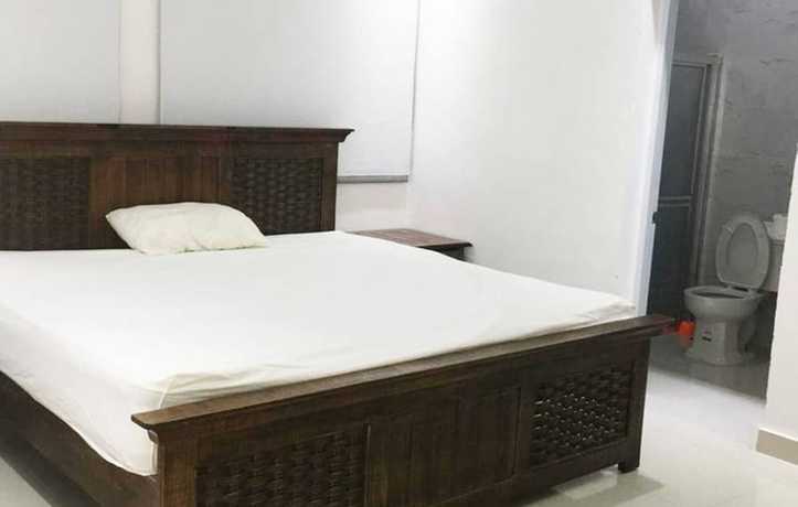 Imagen de la habitación del Hotel Malecon Rooms and. Foto 7