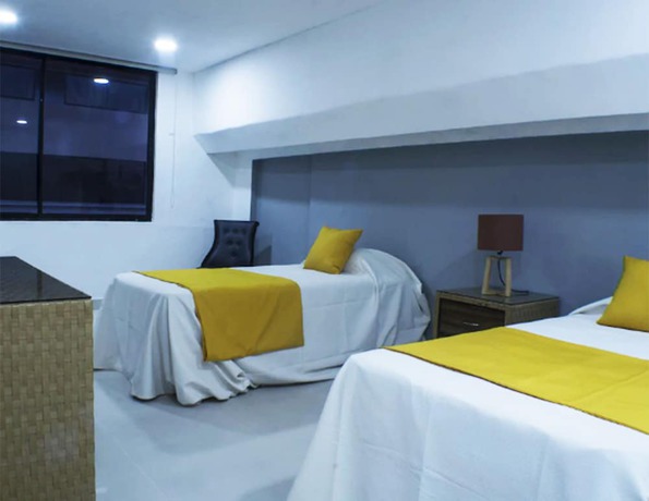 Imagen de la habitación del Hotel Malecon Rooms and. Foto 12