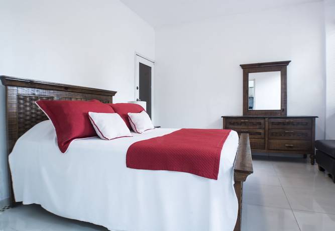 Imagen de la habitación del Hotel Malecon Rooms and. Foto 15