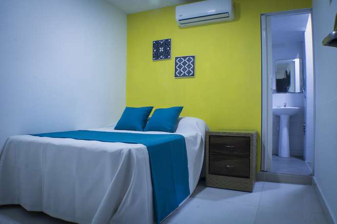 Imagen de la habitación del Hotel Malecon Rooms and. Foto 19