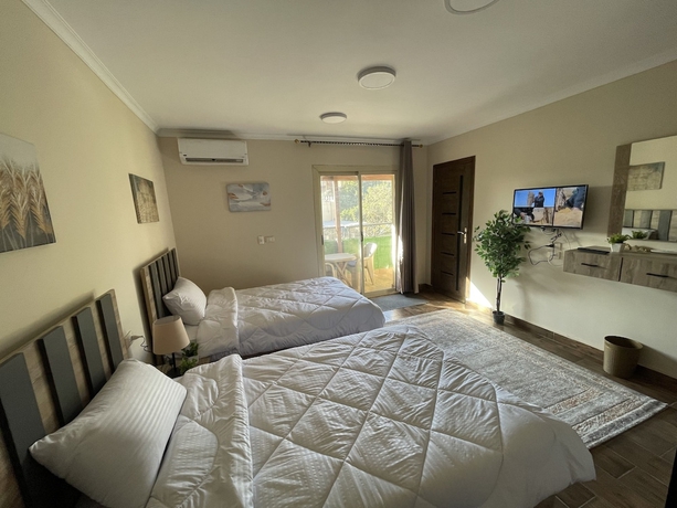 Imagen de la habitación del Hotel Malek Pyramids Guest House. Foto 16