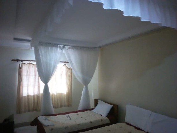 Imagen de la habitación del Hotel Malewa Garden. Foto 14
