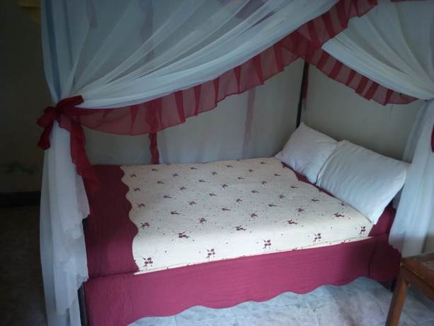 Imagen de la habitación del Hotel Malewa Garden. Foto 16