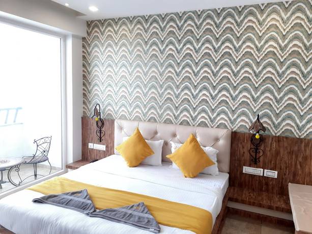 Imagen de la habitación del Hotel Malghotras. Foto 8