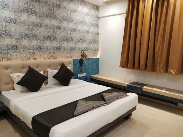 Imagen de la habitación del Hotel Malghotras. Foto 15