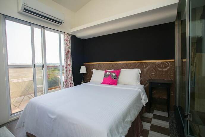 Imagen de la habitación del Hotel Malibu Oceanview Homestay. Foto 21