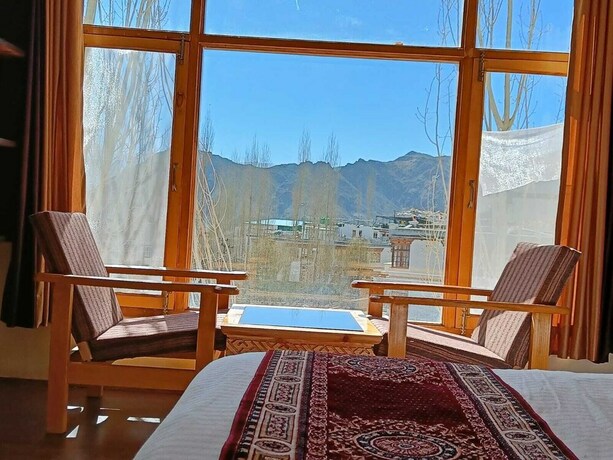 Imagen de la habitación del Hotel Malik Residency. Foto 21