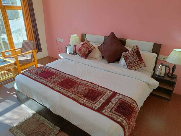 Imagen de la habitación del Hotel Malik Residency. Foto 22