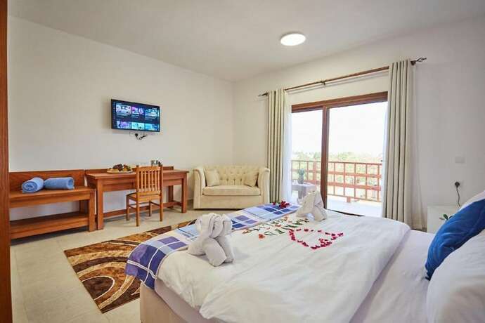 Imagen de la habitación del Hotel Malika Nungwi. Foto 15