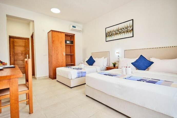 Imagen de la habitación del Hotel Malika Nungwi. Foto 18