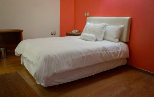 Imagen de la habitación del Hotel Malinalli. Foto 6