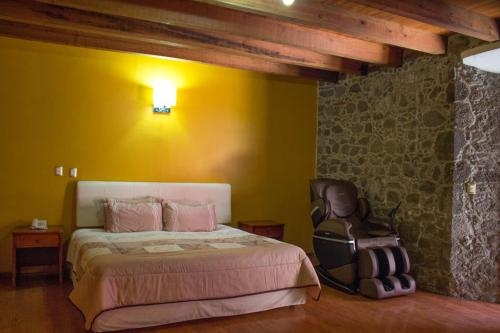 Imagen de la habitación del Hotel Malinalli. Foto 9