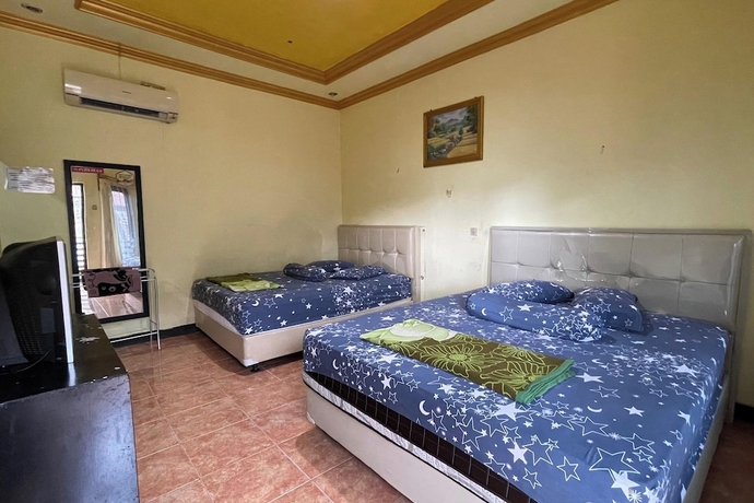 Imagen de la habitación del Hotel Malinda Pangandaran. Foto 2