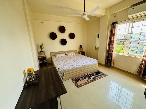 Imagen de la habitación del Hotel Malini Homes - Food and Lodging. Foto 2
