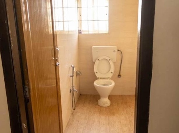 Imagen de la habitación del Hotel Malini Homes - Food and Lodging. Foto 9