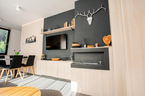 Imagen de la habitación del Hotel Malino Resort & Residences - Ski and Bike Apartments. Foto 15
