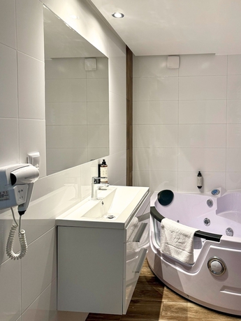 Imagen de la habitación del Hotel Malinowski Leśny. Foto 9