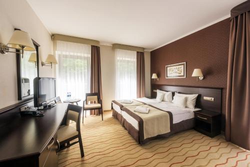 Imagen de la habitación del Hotel Malinowy Dw&oacute;r Medical SPA. Foto 4