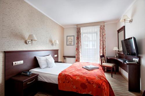 Imagen de la habitación del Hotel Malinowy Dw&oacute;r Medical SPA. Foto 5