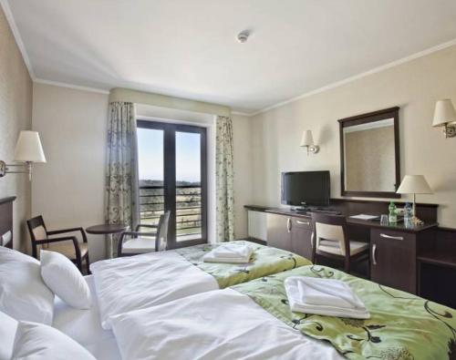 Imagen de la habitación del Hotel Malinowy Dw&oacute;r Medical SPA. Foto 6