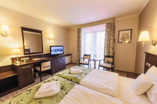 Imagen de la habitación del Hotel Malinowy Dw&oacute;r Medical SPA. Foto 7