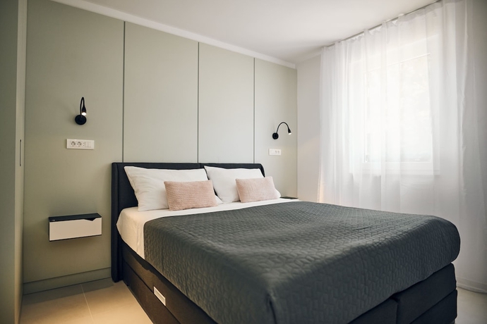 Imagen de la habitación del Hotel Malinska Green Apartments. Foto 14