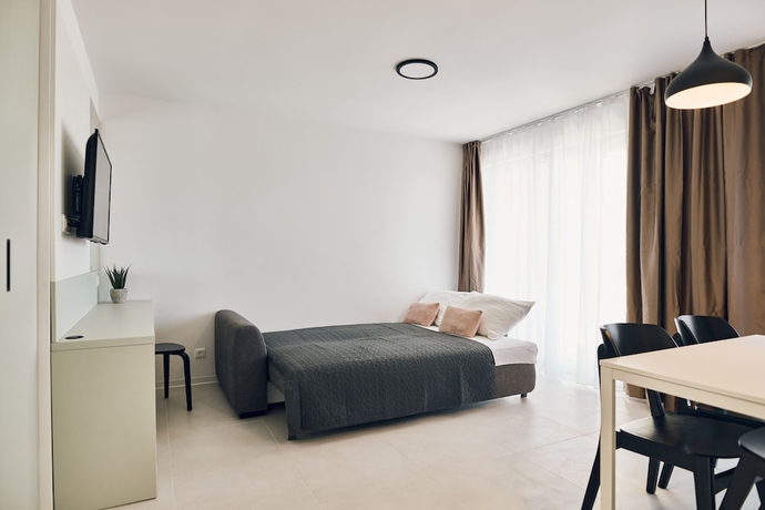 Imagen de la habitación del Hotel Malinska Green Apartments. Foto 17