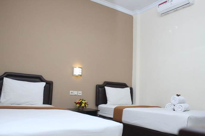 Imagen de la habitación del Hotel Malioboro Garden, Kota Yogyakarta. Foto 5