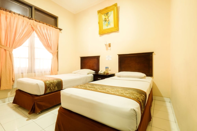 Imagen de la habitación del Hotel Malioboro Inn Solo. Foto 9