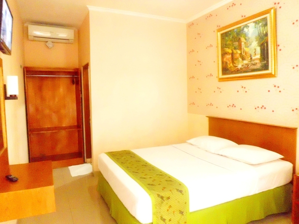 Imagen de la habitación del Hotel Malioboro Inn Solo. Foto 11