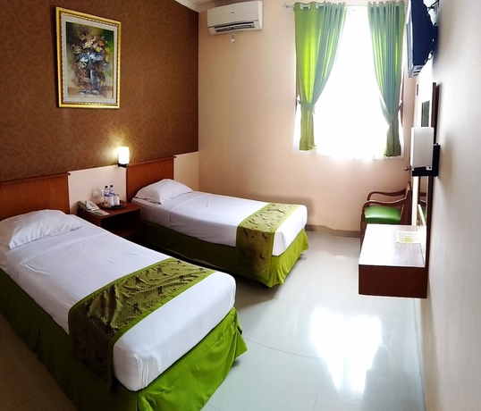 Imagen de la habitación del Hotel Malioboro Inn Solo. Foto 12