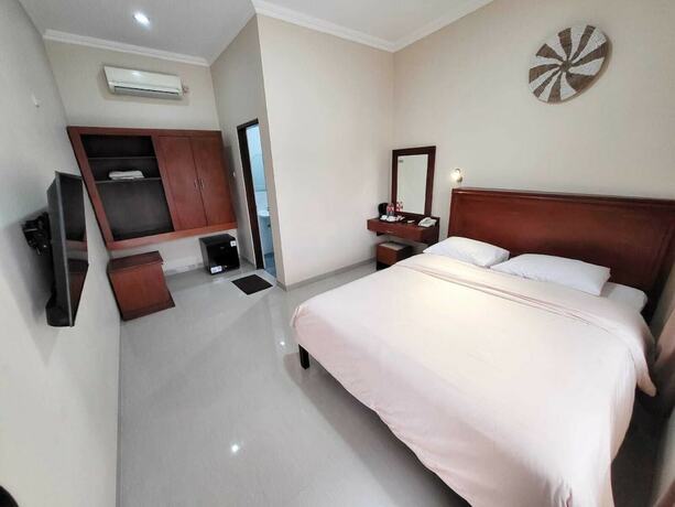 Imagen de la habitación del Hotel Malioboro Inn Yogyakarta. Foto 15