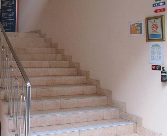 Imagen de la habitación del Hotel Malioboro Inn Yogyakarta. Foto 18