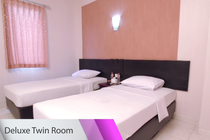 Imagen de la habitación del Hotel Malioboro Palace Hotel. Foto 3