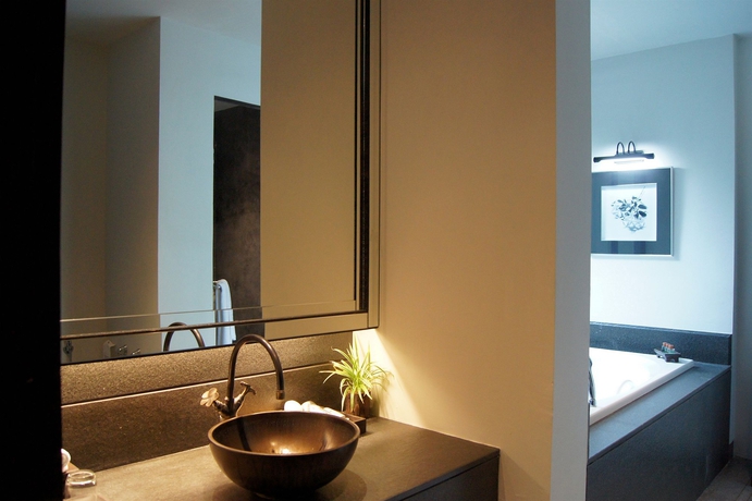 Imagen de la habitación del Hotel Malisa Villa Suites. Foto 2