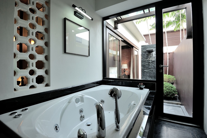 Imagen de la habitación del Hotel Malisa Villa Suites. Foto 6