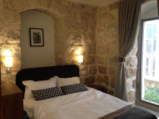 Imagen de la habitación del Hotel Malka. Foto 15