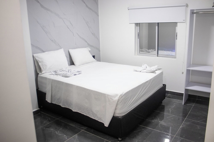 Imagen de la habitación del Hotel Mall Plaza. Foto 4