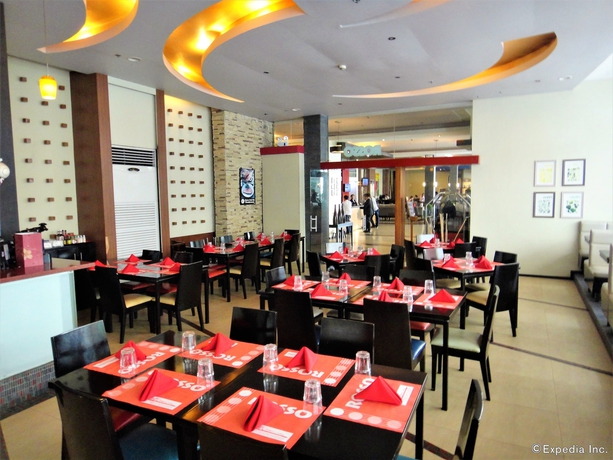 Imagen del bar/restaurante del Hotel Mallberry Suites Business. Foto 6