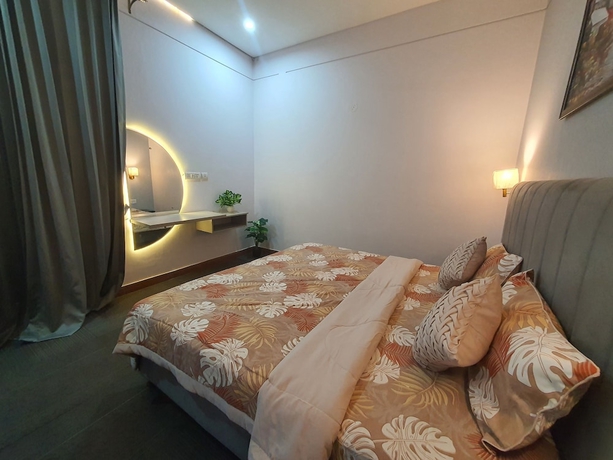 Imagen de la habitación del Hotel Mallenzo suites. Foto 11